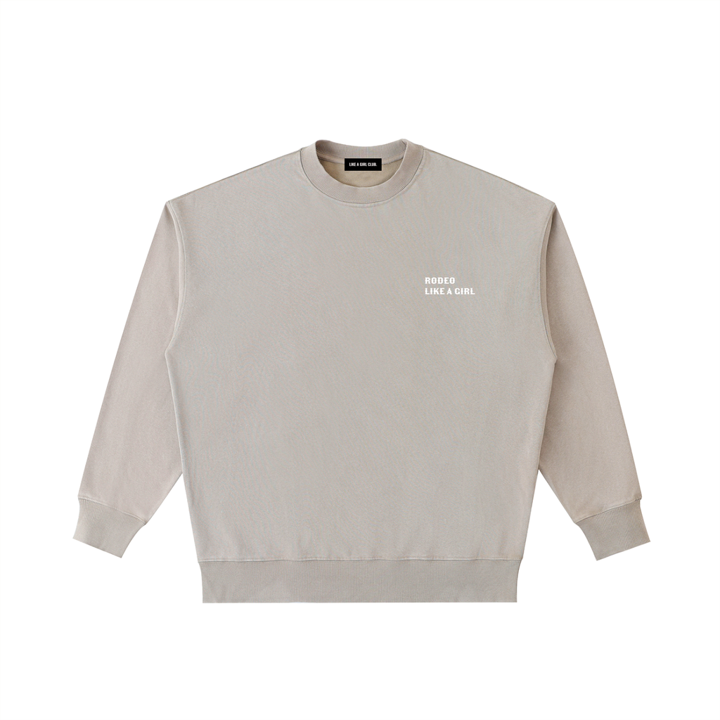 Oversized brown heavyweight crewneck sweatshirt with vintage white Rodeo Show Wild West graphic on back.