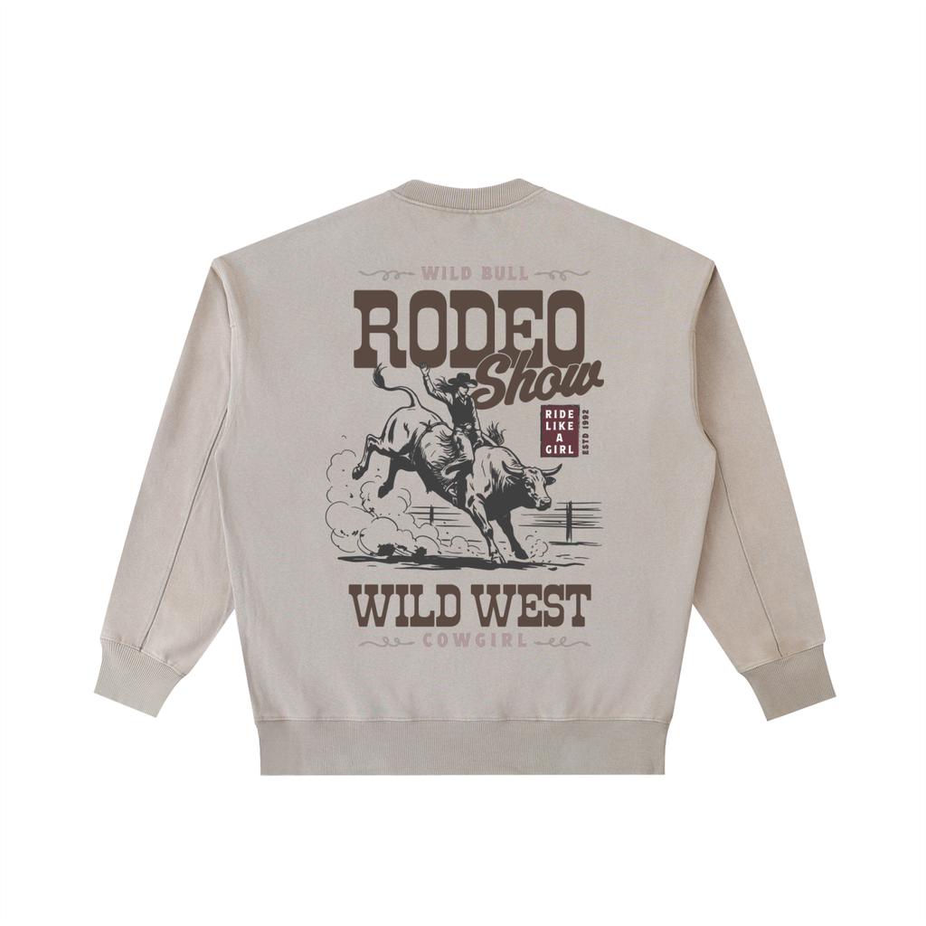Oversized brown heavyweight crewneck sweatshirt with vintage white Rodeo Show Wild West graphic on back.