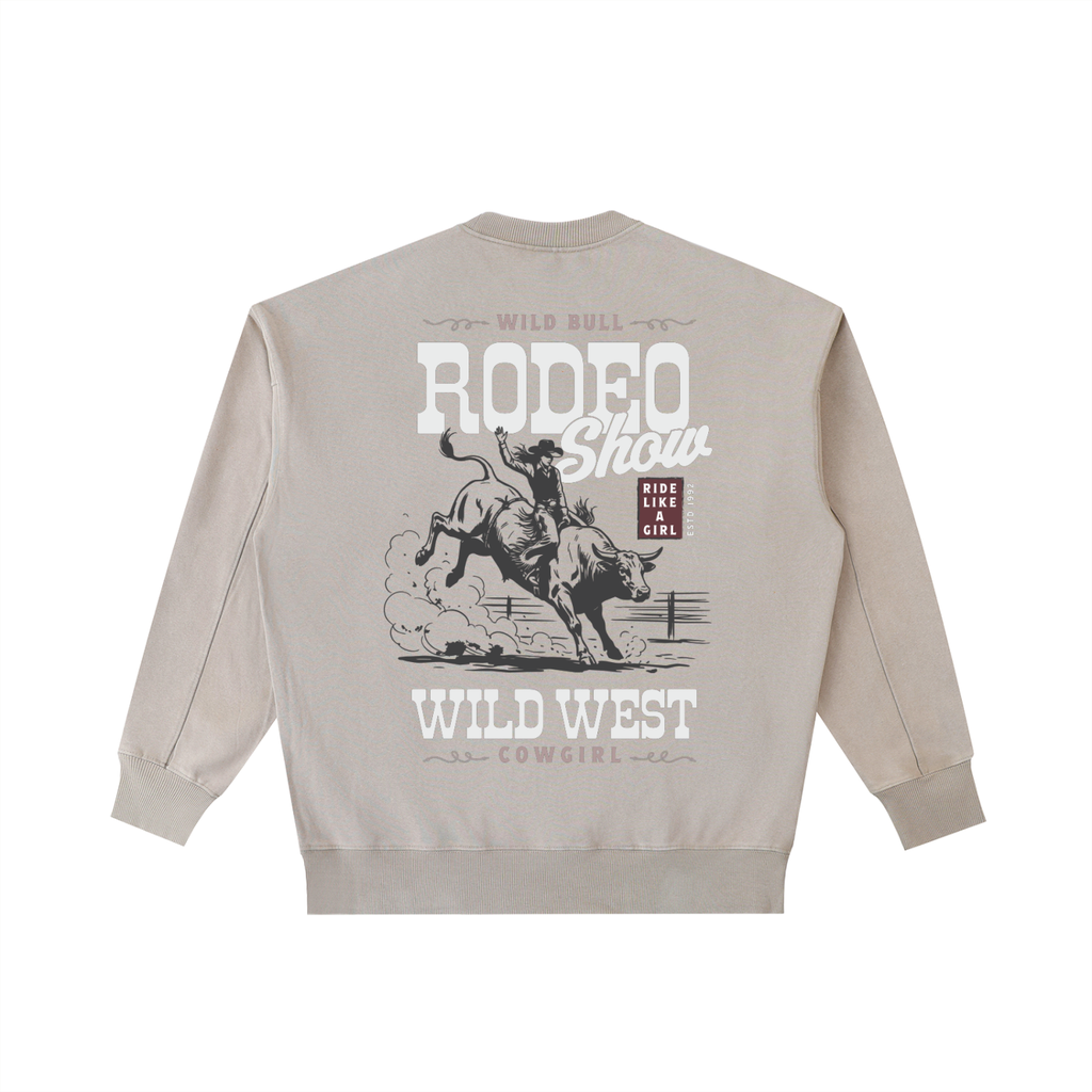 Oversized cream heavyweight crewneck sweatshirt with vintage white Rodeo Show Wild West graphic on back.