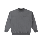 Front view of a boxy charcoal grey heavyweight sweatshirt from LIKE A GIRL CLUB with a premium vintage wash.