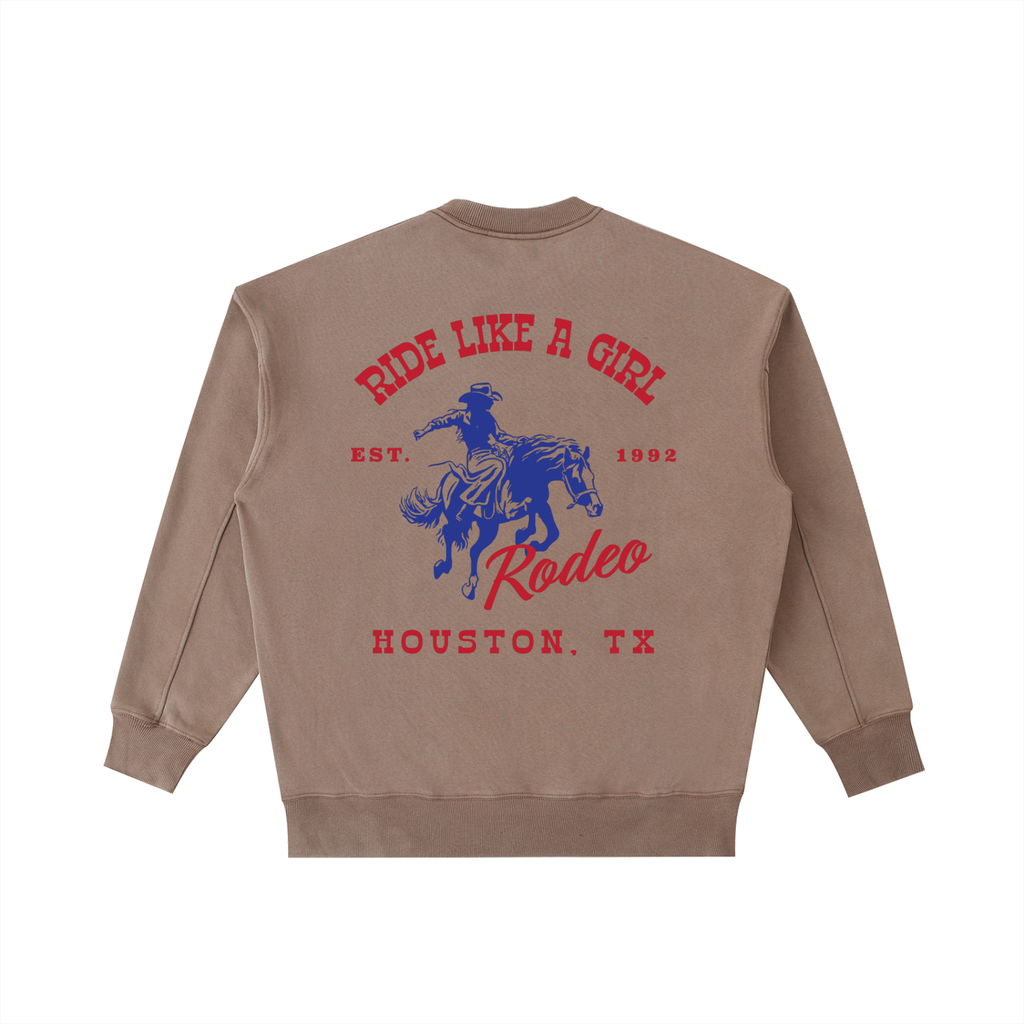 Back view of a Coffee Brown Vintage Washed Crewneck with a red and navy Houston TX Rodeo "Ride Like A Girl" graphic.