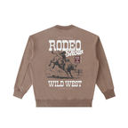 Back view of a Coffee Brown Vintage Washed Heavyweight Crewneck featuring an off-white "Wild West Rodeo Show" graphic.
