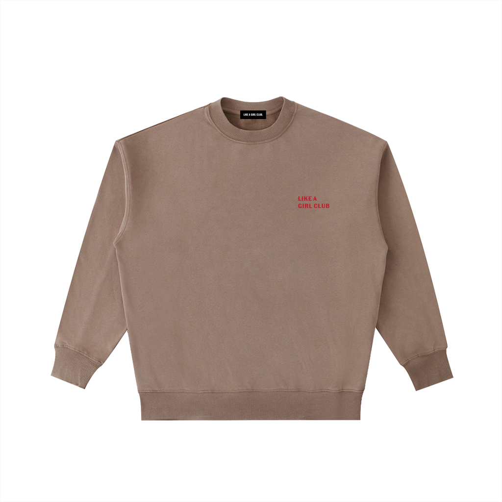 Front view of a boxy coffee brown heavyweight sweatshirt from LIKE A GIRL CLUB with a premium vintage wash.