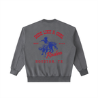 Back view of a Midnight Blue-Grey Vintage Washed Crewneck with a red and blue Houston TX Rodeo graphic.