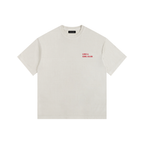 Front view of a boxy off-white heavyweight t-shirt from LIKE A GIRL CLUB with a structured streetwear fit.