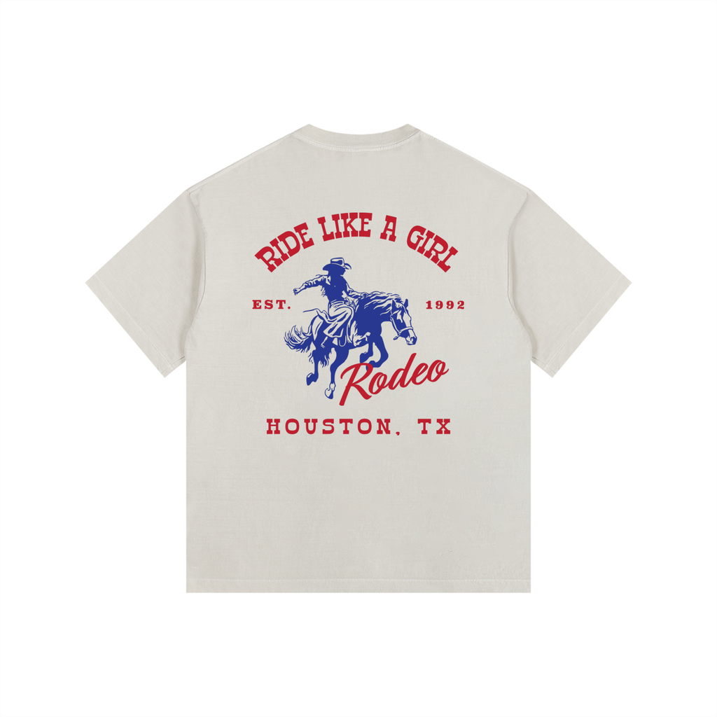 Back view of an Off-White Heavyweight Boxy T-Shirt with a red and blue Houston TX Rodeo "Ride Like A Girl" graphic.