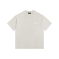 Front view of a boxy, cream heavyweight t-shirt from LIKE A GIRL CLUB with a structured streetwear fit.