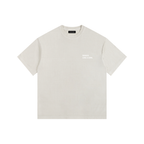 Front view of a boxy, cream heavyweight t-shirt from LIKE A GIRL CLUB with a structured streetwear fit.