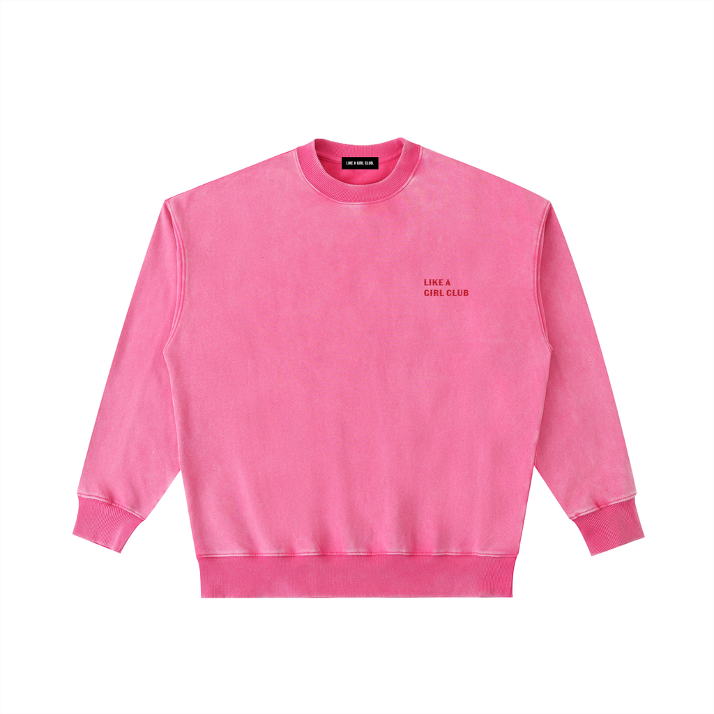 Front view of a boxy pink heavyweight sweatshirt from LIKE A GIRL CLUB with a premium vintage wash.